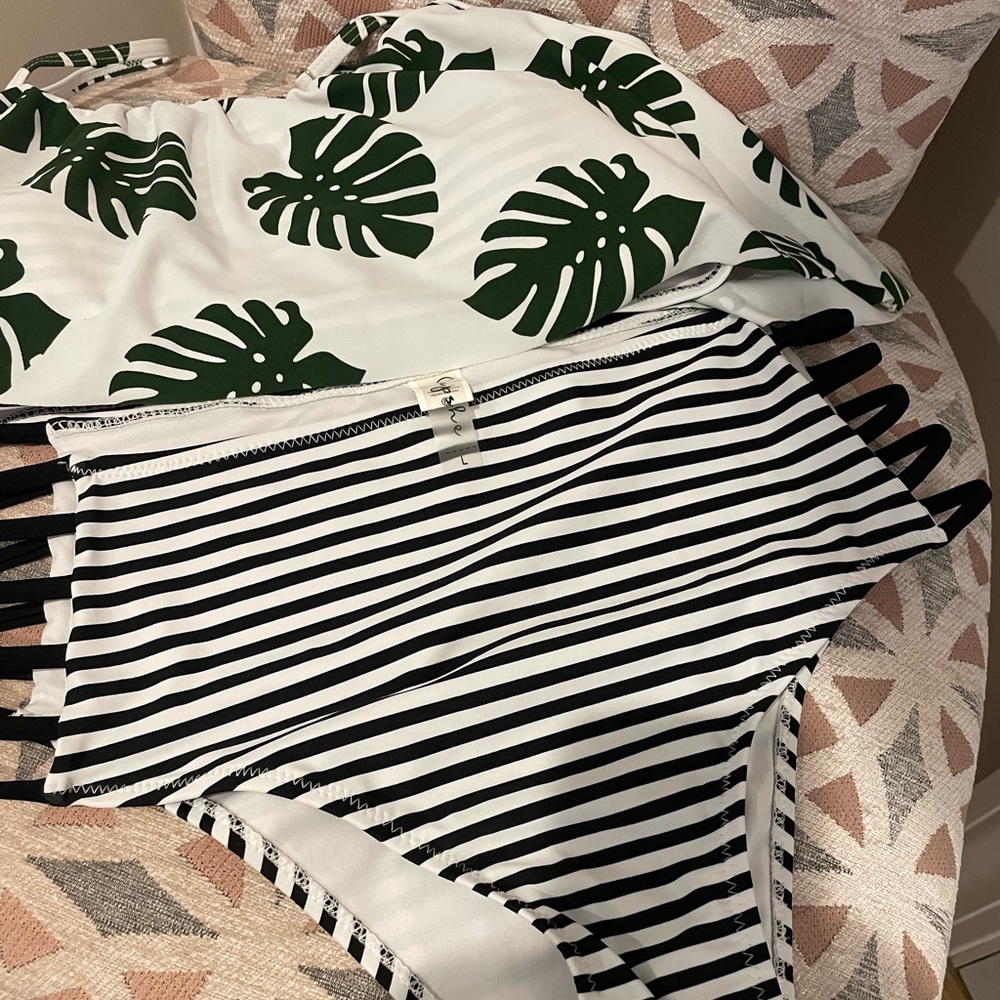 Cupshe 2 piece bathing suit. New without tags. Black & white striped. Size L